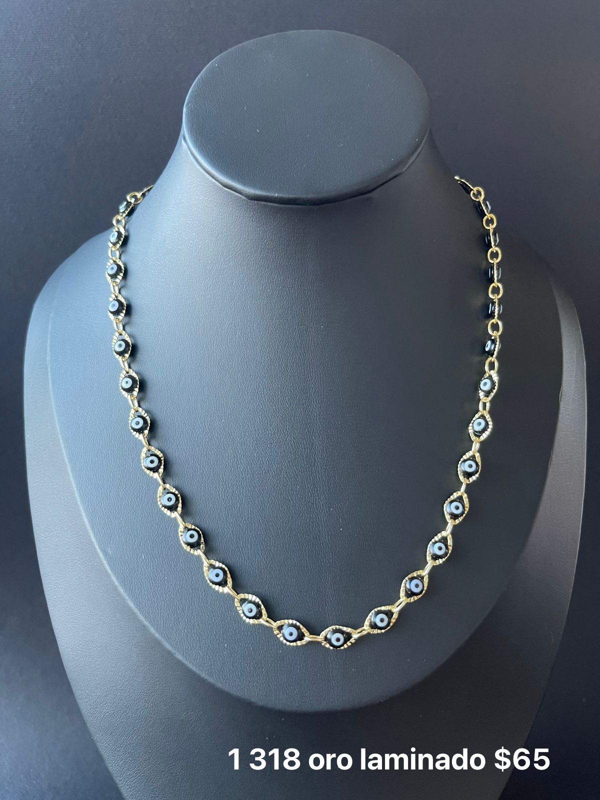 Collar ojo oro laminado