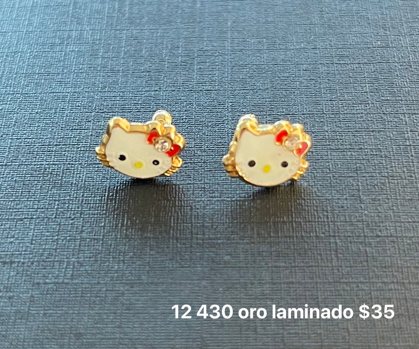 Broquel oro laminado y esmalte