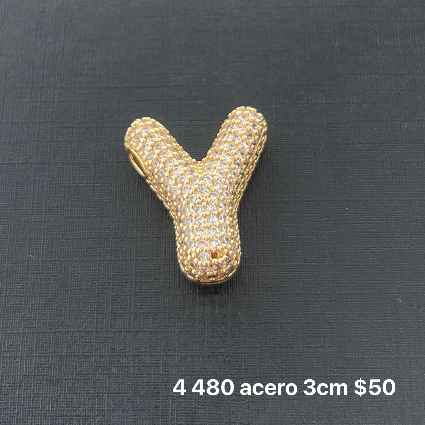 Letra transversal acero y zirconia