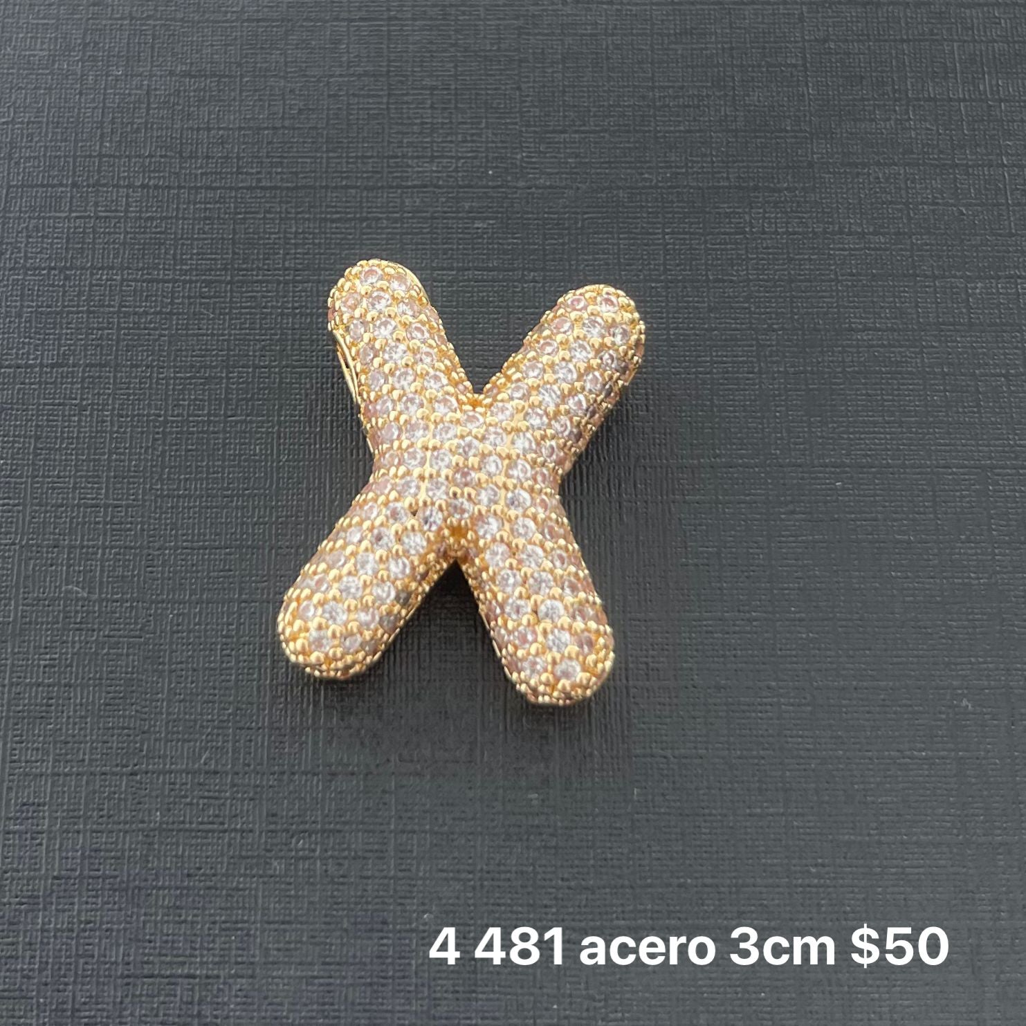 Letra transversal acero y zirconia