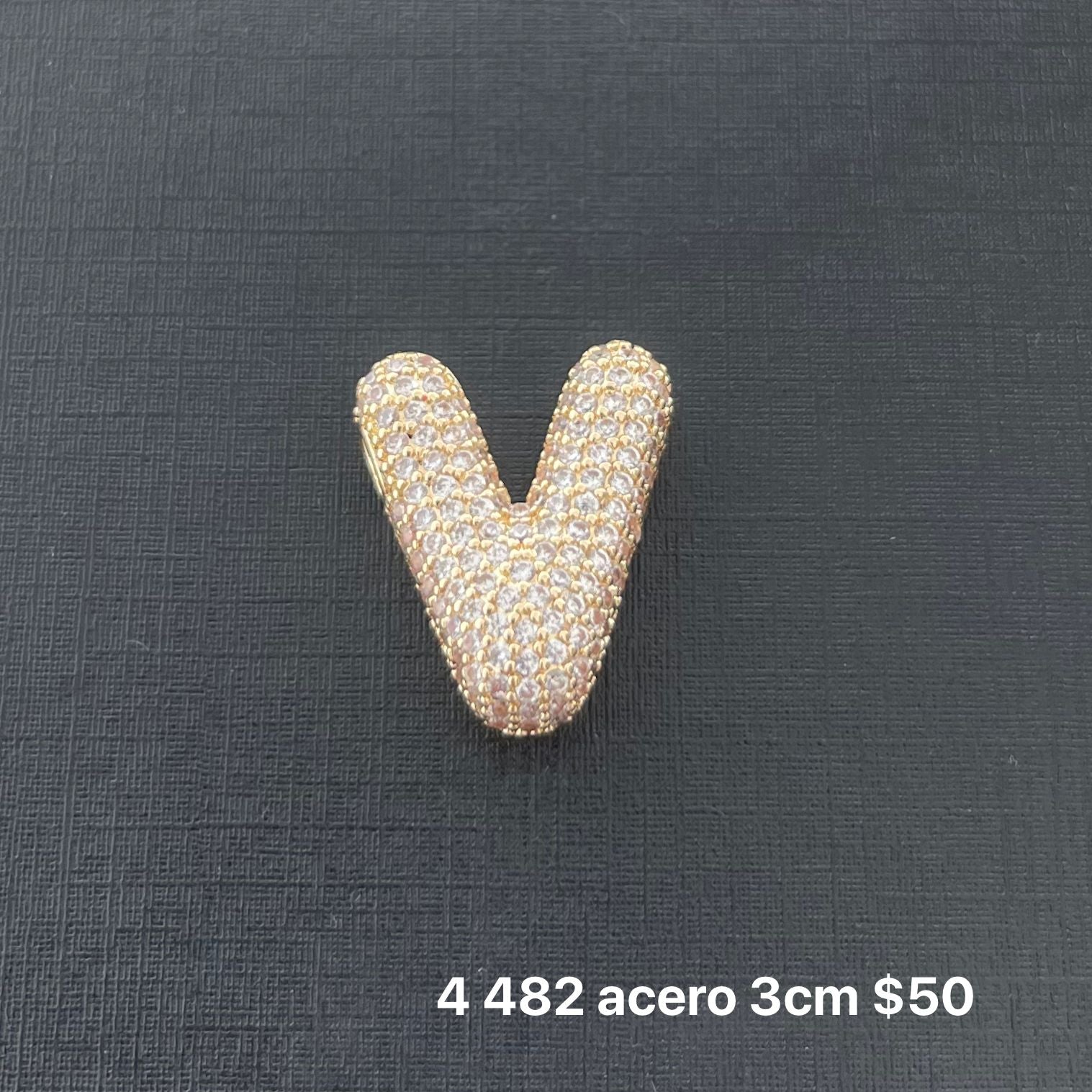 Letra transversal acero y zirconia