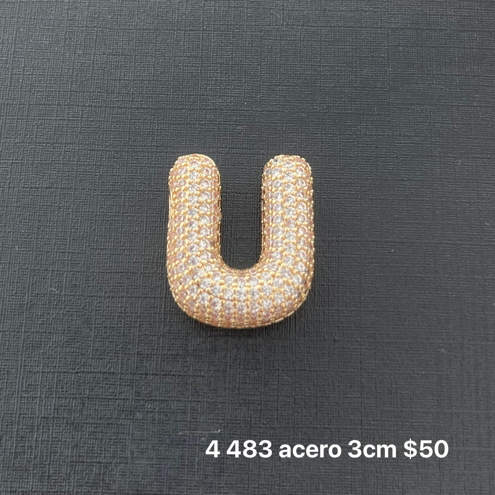 Letra transversal acero y zirconia