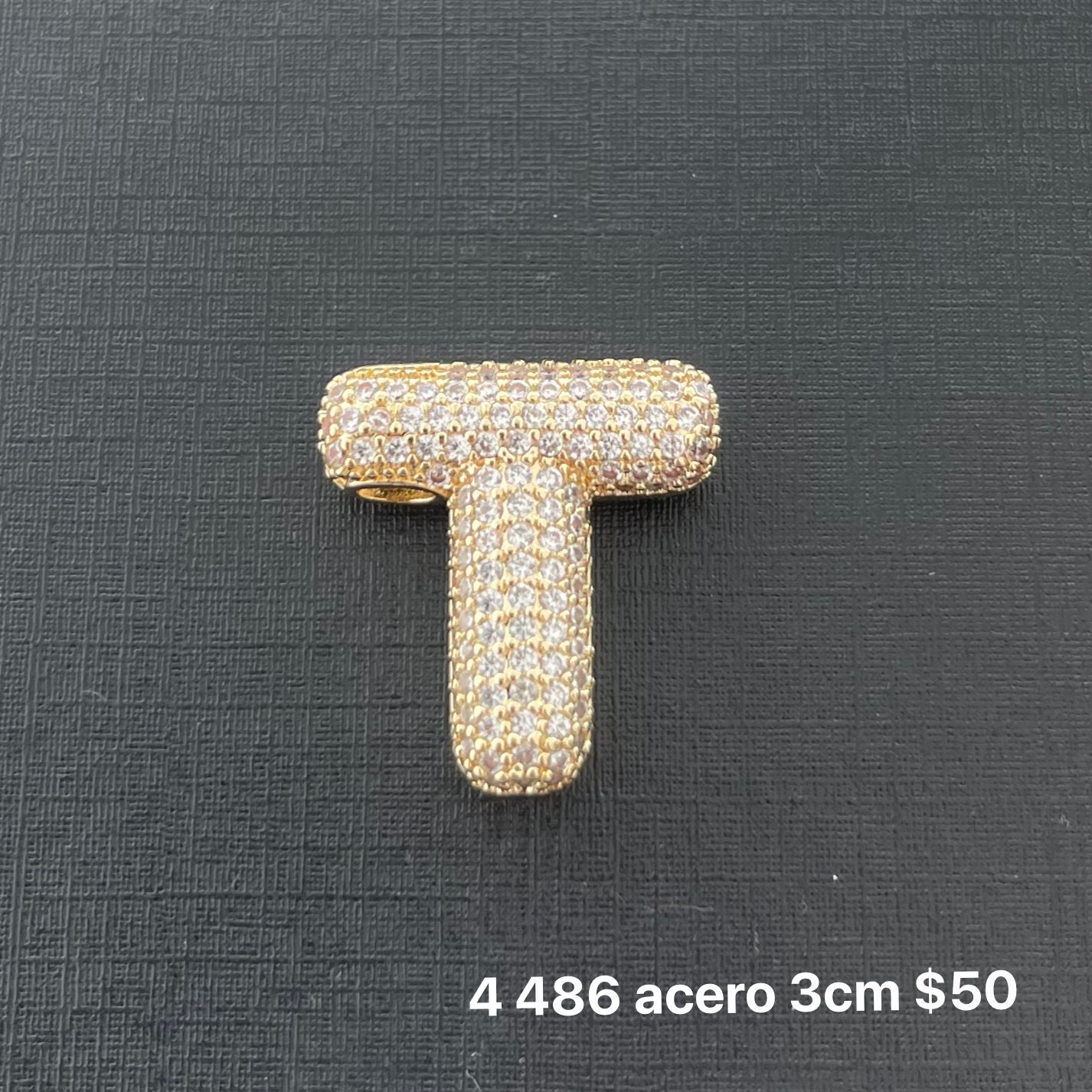 Letra transversal acero y zirconia