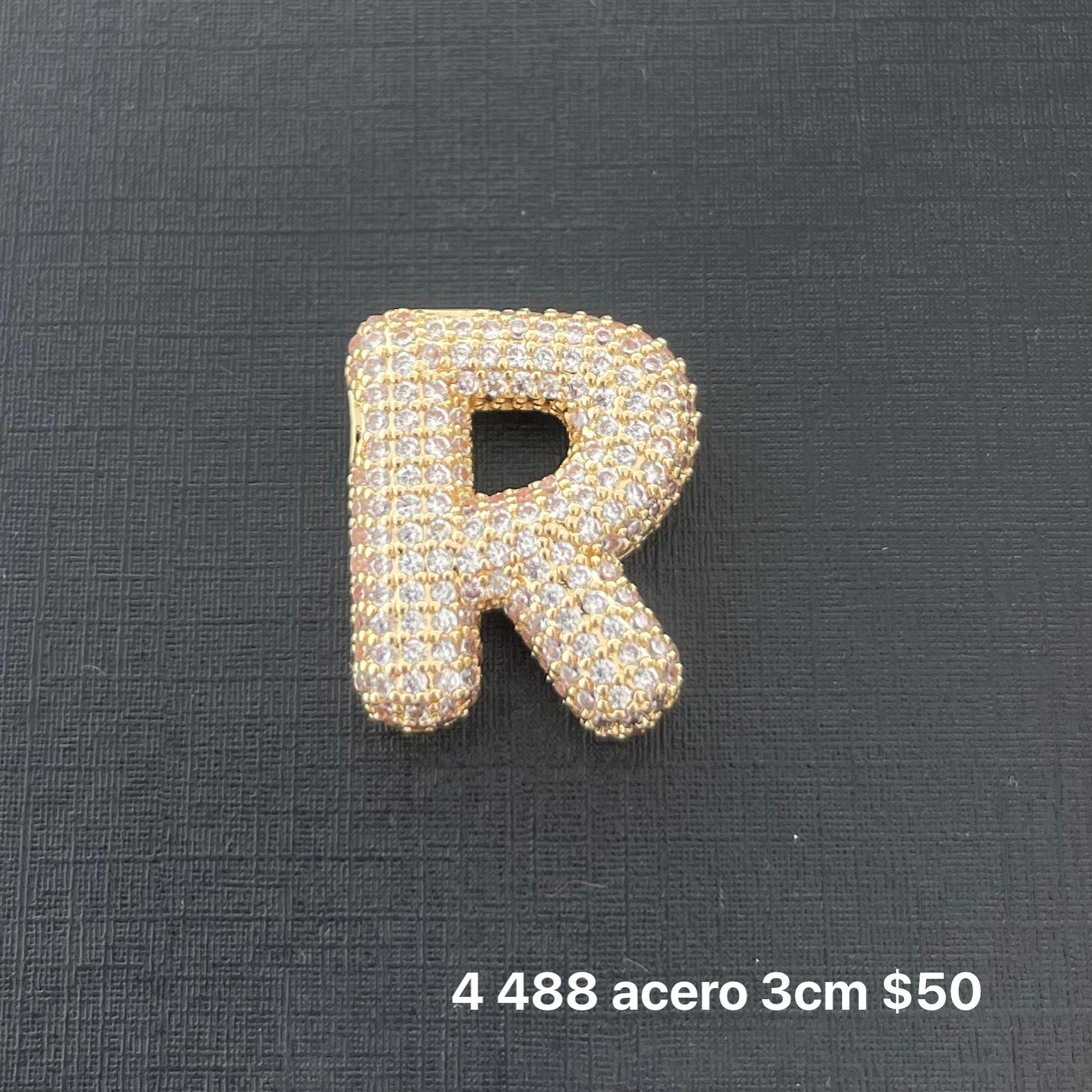 Letra transversal acero y zirconia