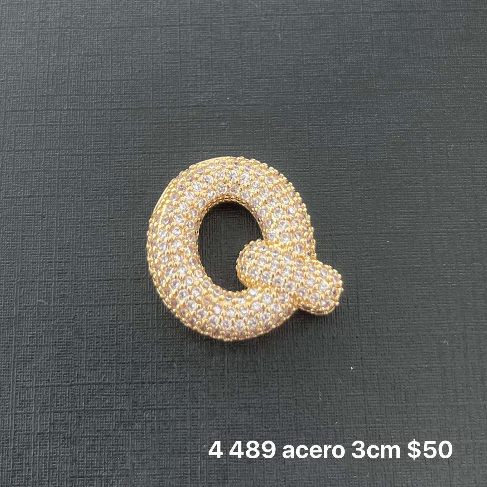 Letra transversal acero y zirconia