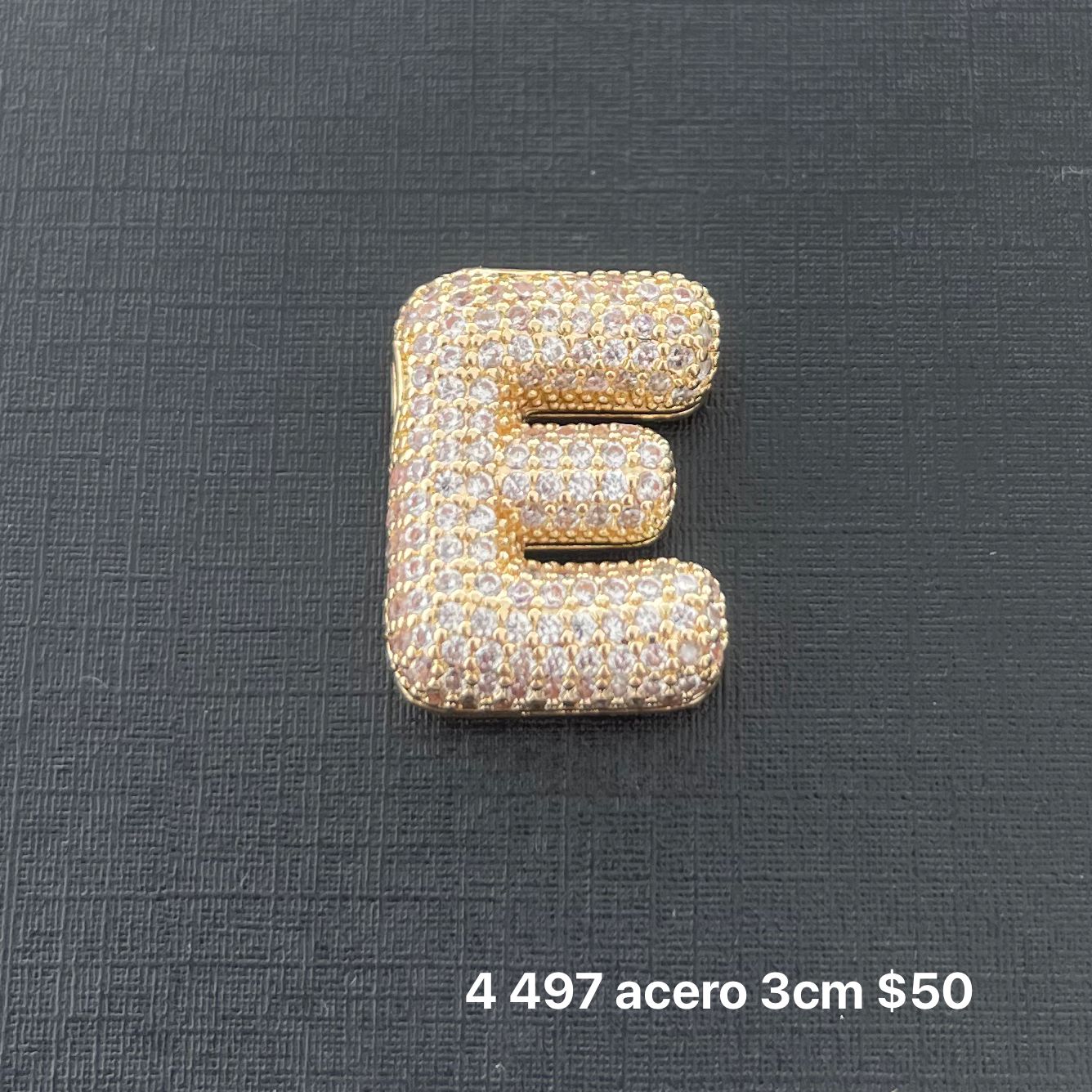 Letra transversal acero y zirconia